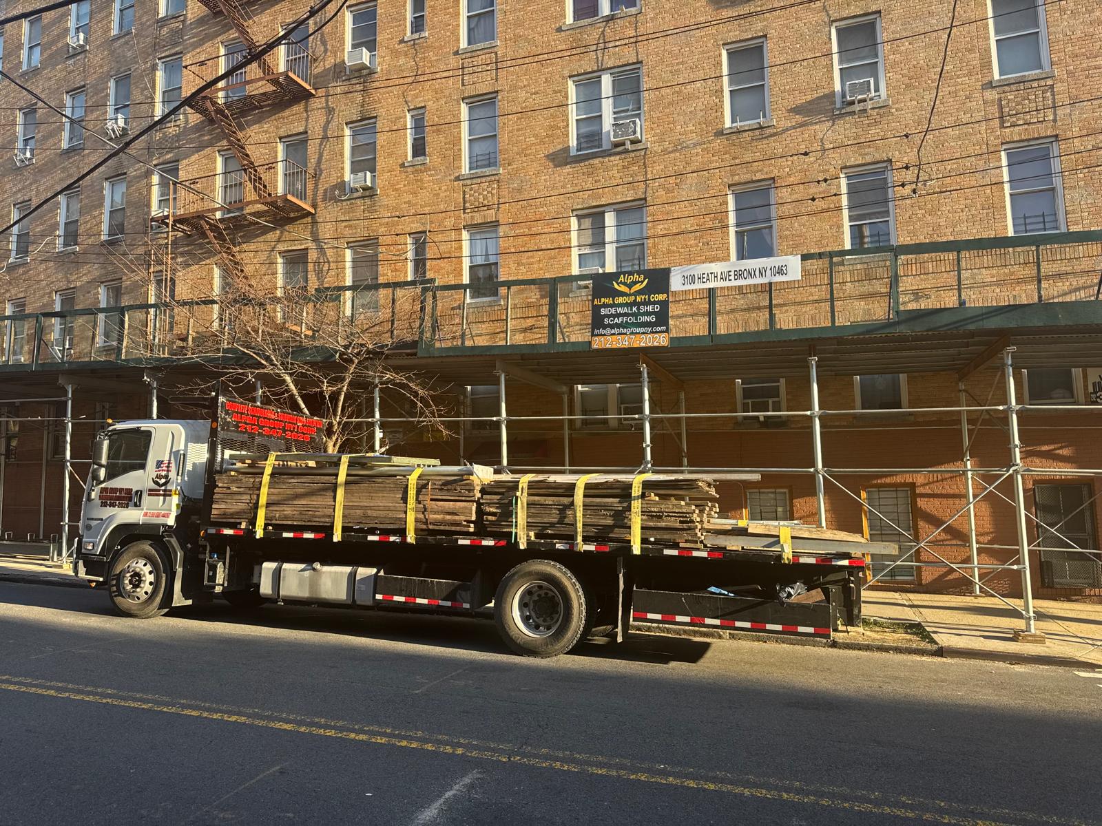 Building facade restoration project in NYC with brick repair and exterior waterproofing