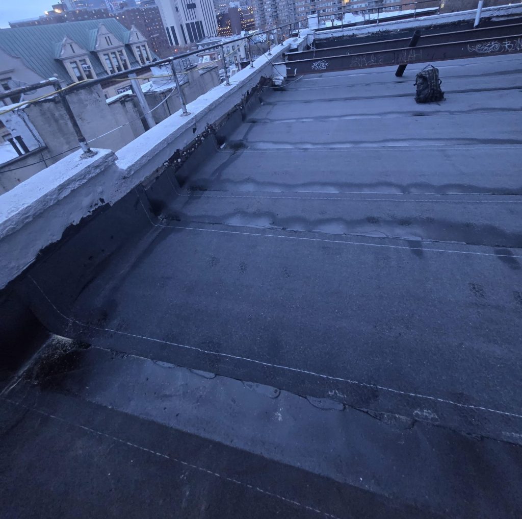Flat Roof Replacement Project in Downtown Manhattan NYC with new roofing system